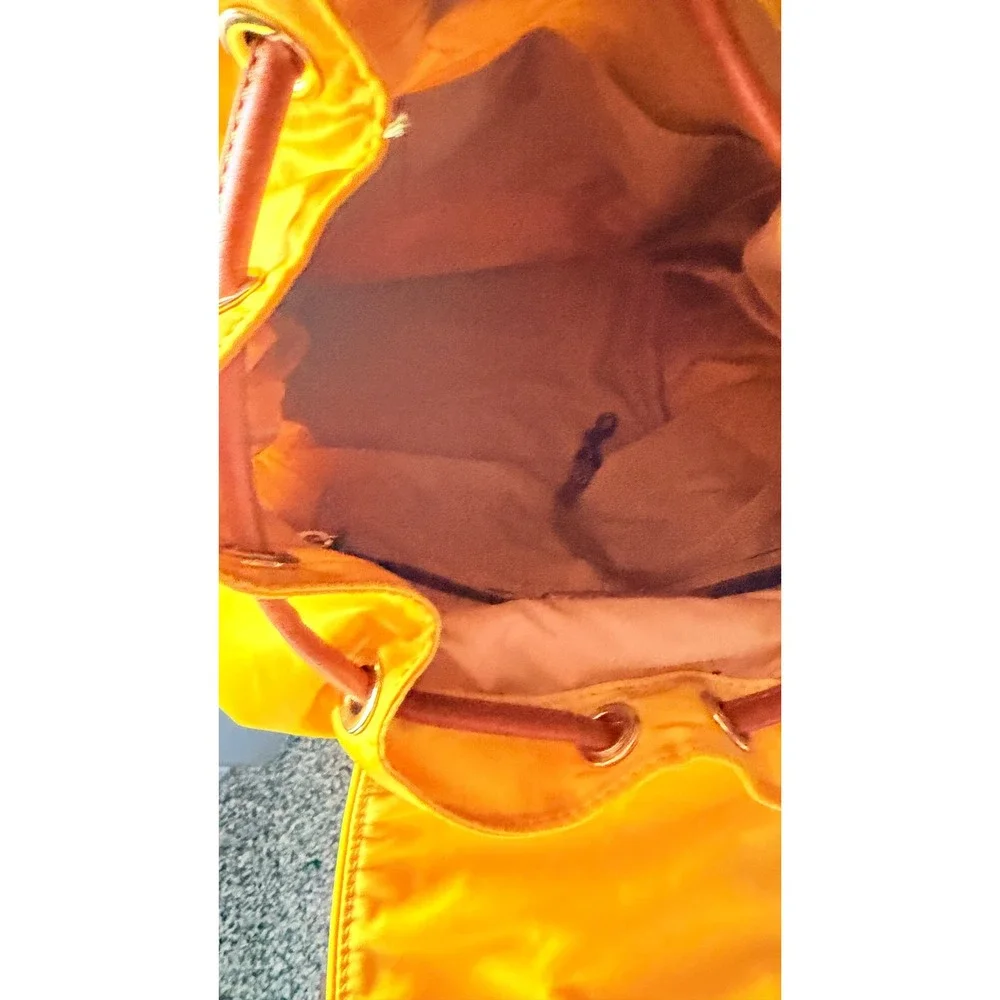 Dooney & Bourke Nylon Murphy Backpack Flap Tassel Drawstring Womens Yellow
